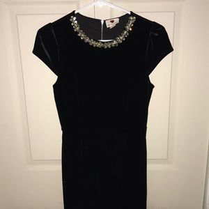 Black velvet dress with jewel neckline